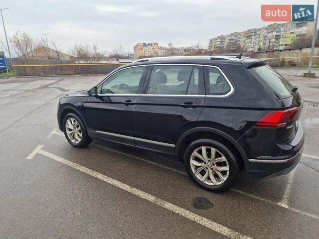 Черный Фольксваген Тигуан, объемом двигателя 1.98 л и пробегом 243 тыс. км за 23310 $, фото 1 на Automoto.ua