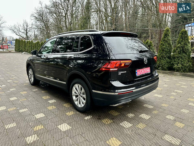 Чорний Фольксваген Тігуан, об'ємом двигуна 2 л та пробігом 186 тис. км за 17300 $, фото 13 на Automoto.ua