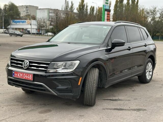 Чорний Фольксваген Тігуан, об'ємом двигуна 2 л та пробігом 139 тис. км за 16900 $, фото 1 на Automoto.ua