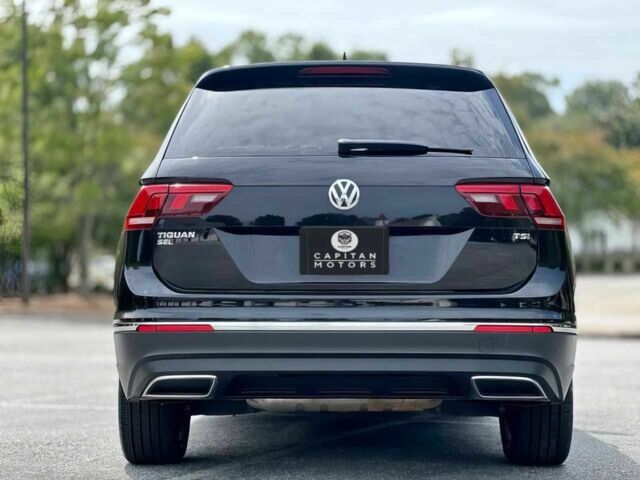 Чорний Фольксваген Тігуан, об'ємом двигуна 2 л та пробігом 37 тис. км за 4000 $, фото 5 на Automoto.ua