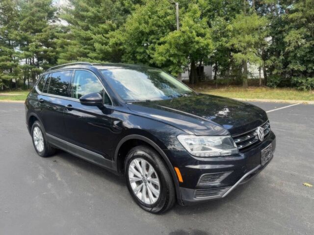Черный Фольксваген Тигуан, объемом двигателя 2 л и пробегом 37 тыс. км за 13000 $, фото 1 на Automoto.ua