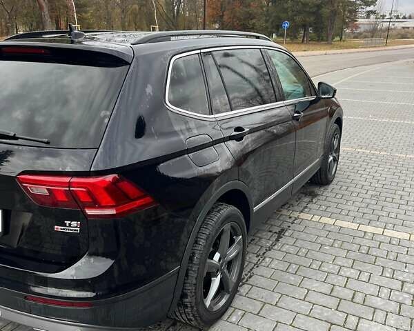 Черный Фольксваген Тигуан, объемом двигателя 1.98 л и пробегом 160 тыс. км за 18000 $, фото 1 на Automoto.ua