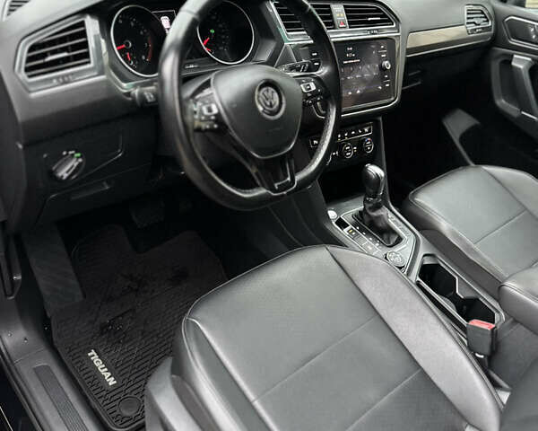 Чорний Фольксваген Тігуан, об'ємом двигуна 2 л та пробігом 186 тис. км за 17300 $, фото 22 на Automoto.ua