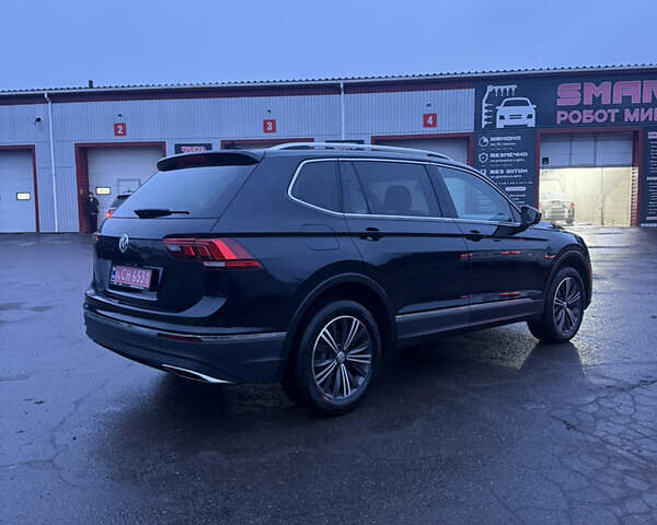 Чорний Фольксваген Тігуан, об'ємом двигуна 2 л та пробігом 162 тис. км за 18750 $, фото 3 на Automoto.ua