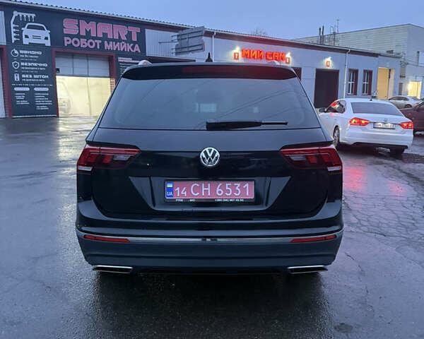 Чорний Фольксваген Тігуан, об'ємом двигуна 2 л та пробігом 162 тис. км за 18750 $, фото 7 на Automoto.ua