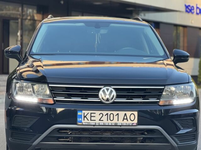 Чорний Фольксваген Тігуан, об'ємом двигуна 2 л та пробігом 123 тис. км за 18400 $, фото 1 на Automoto.ua