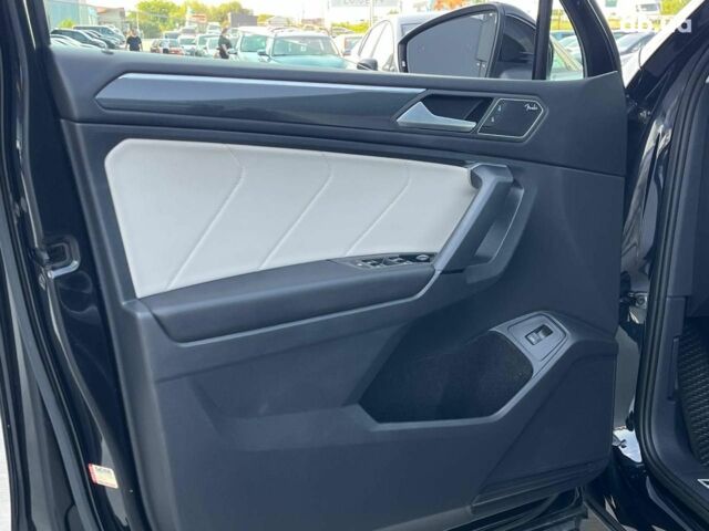 Черный Фольксваген Тигуан, объемом двигателя 2 л и пробегом 161 тыс. км за 25690 $, фото 18 на Automoto.ua