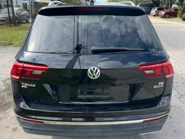 Чорний Фольксваген Тігуан, об'ємом двигуна 2 л та пробігом 34 тис. км за 4600 $, фото 2 на Automoto.ua