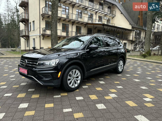 Чорний Фольксваген Тігуан, об'ємом двигуна 2 л та пробігом 186 тис. км за 17300 $, фото 1 на Automoto.ua