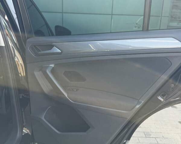 Черный Фольксваген Тигуан, объемом двигателя 1.98 л и пробегом 220 тыс. км за 22000 $, фото 10 на Automoto.ua