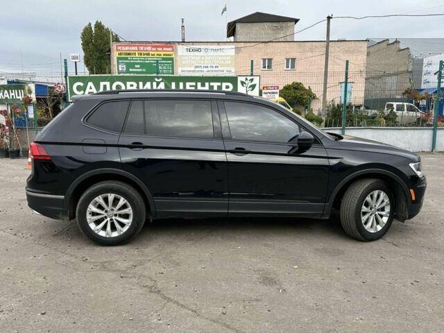 Чорний Фольксваген Тігуан, об'ємом двигуна 2 л та пробігом 139 тис. км за 16900 $, фото 4 на Automoto.ua