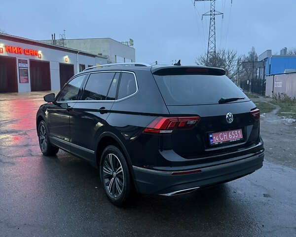 Чорний Фольксваген Тігуан, об'ємом двигуна 2 л та пробігом 162 тис. км за 18750 $, фото 4 на Automoto.ua