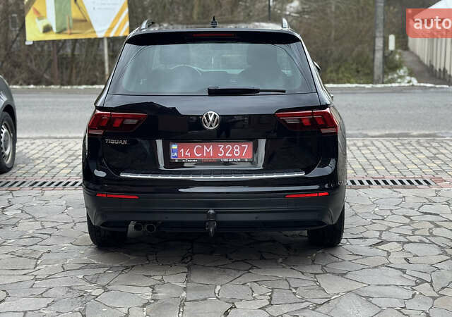 Чорний Фольксваген Тігуан, об'ємом двигуна 1.98 л та пробігом 258 тис. км за 23300 $, фото 2 на Automoto.ua