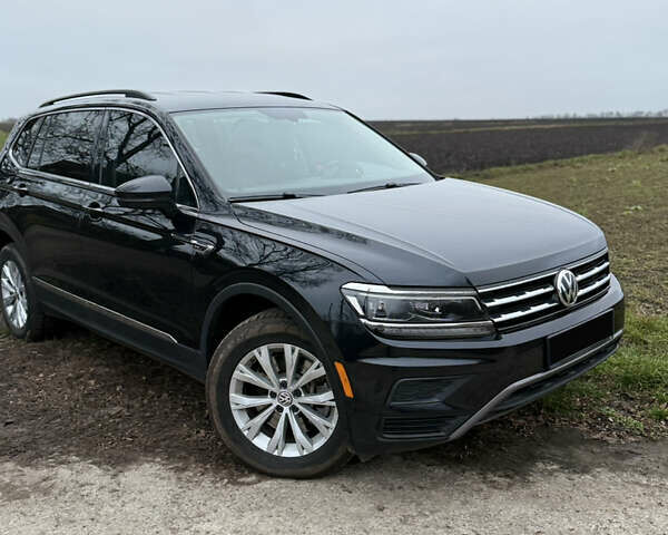 Чорний Фольксваген Тігуан, об'ємом двигуна 1.98 л та пробігом 78 тис. км за 23500 $, фото 2 на Automoto.ua