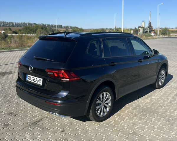 Чорний Фольксваген Тігуан, об'ємом двигуна 2 л та пробігом 76 тис. км за 18900 $, фото 3 на Automoto.ua