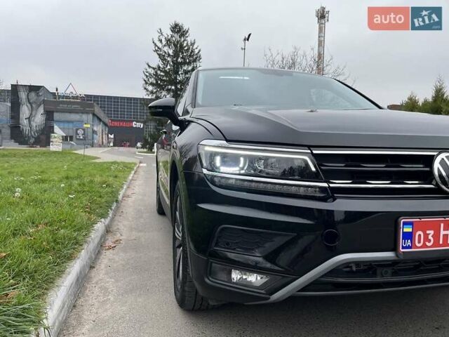 Чорний Фольксваген Тігуан, об'ємом двигуна 2 л та пробігом 124 тис. км за 19500 $, фото 110 на Automoto.ua