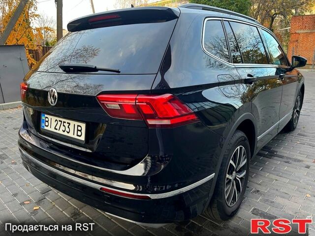 Черный Фольксваген Тигуан, объемом двигателя 2 л и пробегом 133 тыс. км за 22000 $, фото 5 на Automoto.ua