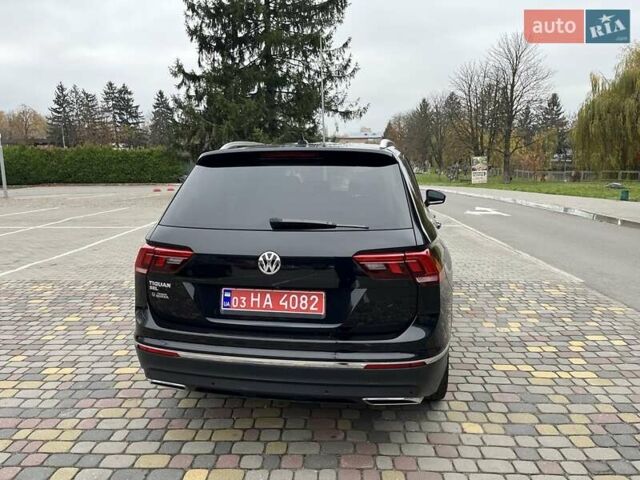 Чорний Фольксваген Тігуан, об'ємом двигуна 2 л та пробігом 124 тис. км за 19500 $, фото 9 на Automoto.ua