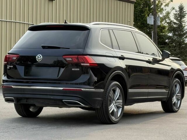 Чорний Фольксваген Тігуан, об'ємом двигуна 2 л та пробігом 34 тис. км за 11300 $, фото 3 на Automoto.ua