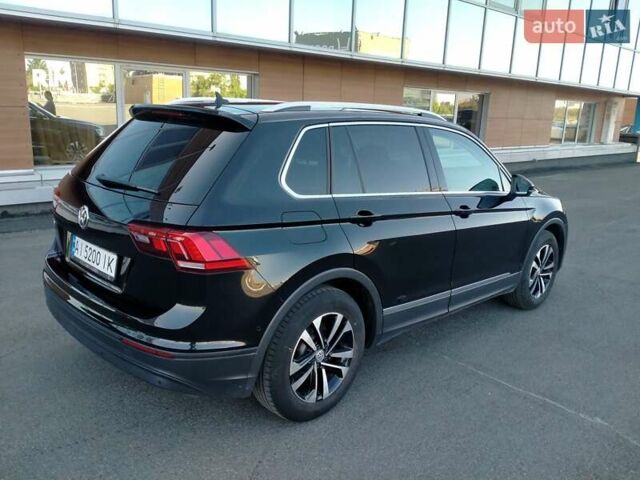 Чорний Фольксваген Тігуан, об'ємом двигуна 1.97 л та пробігом 197 тис. км за 23000 $, фото 3 на Automoto.ua