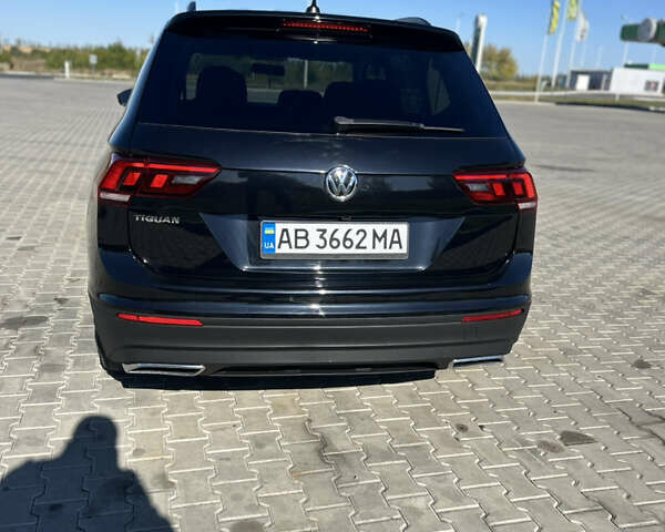 Чорний Фольксваген Тігуан, об'ємом двигуна 2 л та пробігом 76 тис. км за 18900 $, фото 4 на Automoto.ua