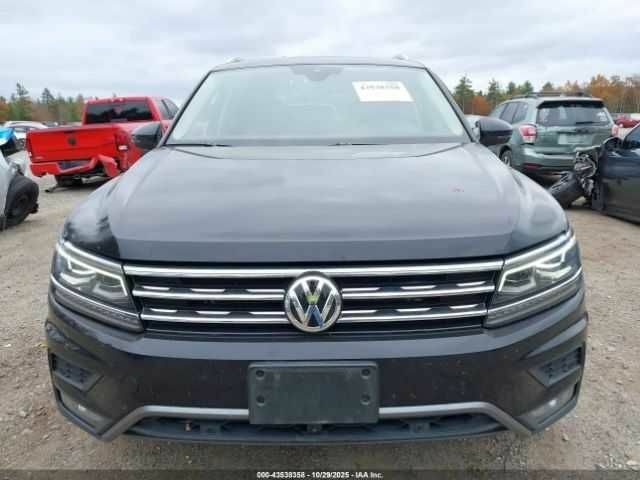 Черный Фольксваген Тигуан, объемом двигателя 2 л и пробегом 67 тыс. км за 5000 $, фото 12 на Automoto.ua