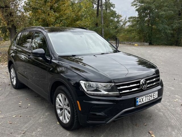 Черный Фольксваген Тигуан, объемом двигателя 2 л и пробегом 129 тыс. км за 19000 $, фото 1 на Automoto.ua