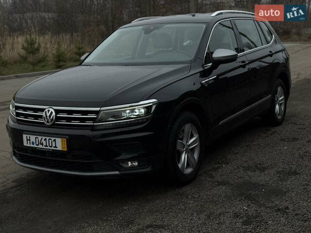 Черный Фольксваген Тигуан, объемом двигателя 1.98 л и пробегом 220 тыс. км за 26500 $, фото 2 на Automoto.ua