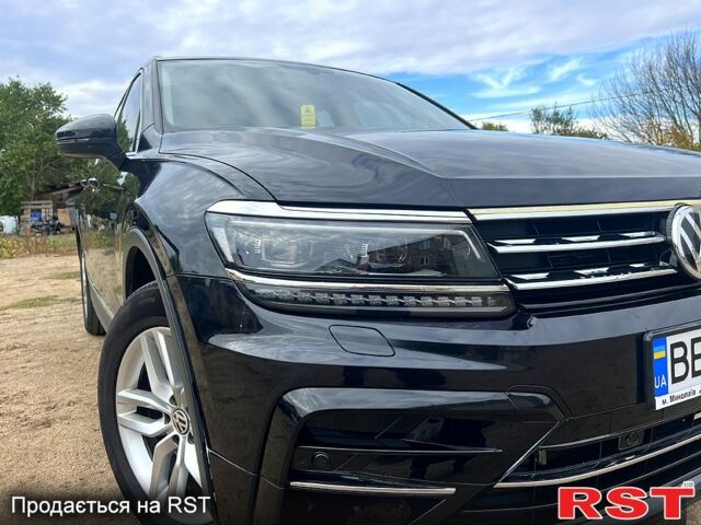 Черный Фольксваген Тигуан, объемом двигателя 2 л и пробегом 170 тыс. км за 21500 $, фото 2 на Automoto.ua