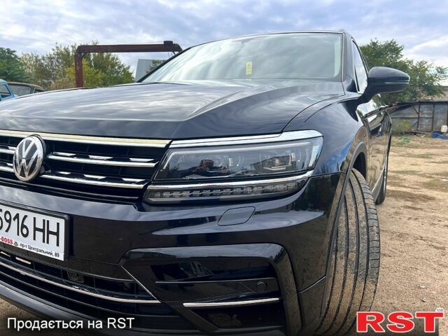 Черный Фольксваген Тигуан, объемом двигателя 2 л и пробегом 170 тыс. км за 21500 $, фото 1 на Automoto.ua