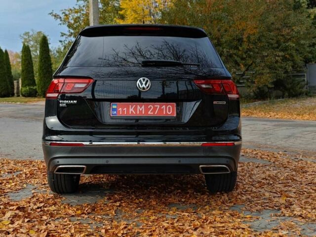 Черный Фольксваген Тигуан, объемом двигателя 2 л и пробегом 314 тыс. км за 14700 $, фото 4 на Automoto.ua