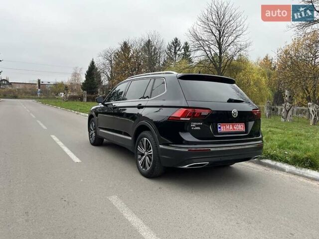 Чорний Фольксваген Тігуан, об'ємом двигуна 2 л та пробігом 124 тис. км за 19500 $, фото 101 на Automoto.ua