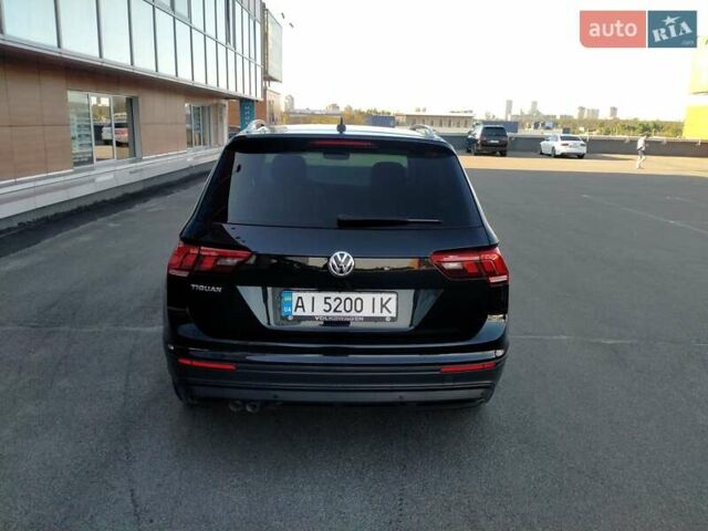 Чорний Фольксваген Тігуан, об'ємом двигуна 1.97 л та пробігом 197 тис. км за 23000 $, фото 4 на Automoto.ua
