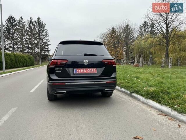 Чорний Фольксваген Тігуан, об'ємом двигуна 2 л та пробігом 124 тис. км за 19500 $, фото 105 на Automoto.ua