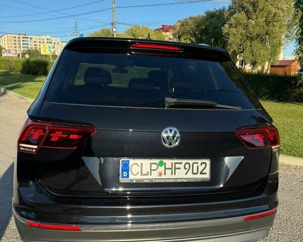 Чорний Фольксваген Тігуан, об'ємом двигуна 2 л та пробігом 223 тис. км за 27799 $, фото 5 на Automoto.ua
