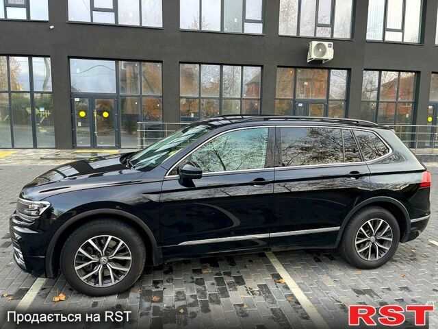 Черный Фольксваген Тигуан, объемом двигателя 2 л и пробегом 133 тыс. км за 22000 $, фото 4 на Automoto.ua