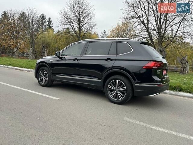Чорний Фольксваген Тігуан, об'ємом двигуна 2 л та пробігом 124 тис. км за 19500 $, фото 100 на Automoto.ua