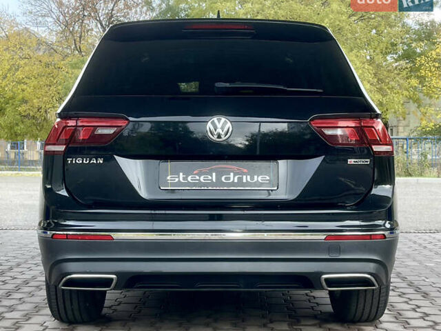 Черный Фольксваген Тигуан, объемом двигателя 1.98 л и пробегом 170 тыс. км за 22499 $, фото 5 на Automoto.ua