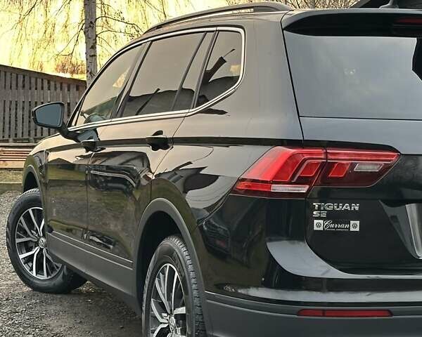 Чорний Фольксваген Тігуан, об'ємом двигуна 2 л та пробігом 200 тис. км за 15900 $, фото 9 на Automoto.ua