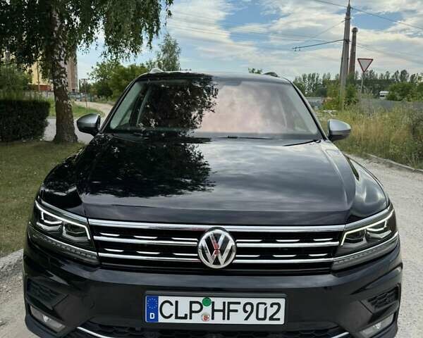 Чорний Фольксваген Тігуан, об'ємом двигуна 2 л та пробігом 223 тис. км за 27799 $, фото 7 на Automoto.ua