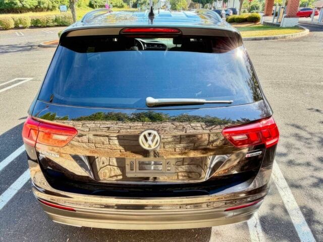 Черный Фольксваген Тигуан, объемом двигателя 2 л и пробегом 35 тыс. км за 14000 $, фото 5 на Automoto.ua