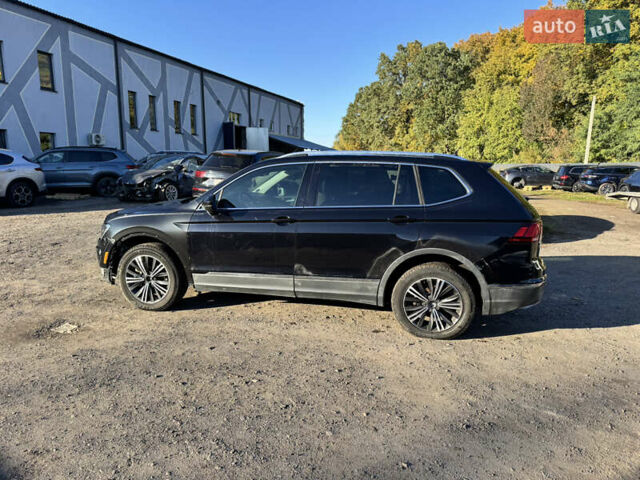 Черный Фольксваген Тигуан, объемом двигателя 2 л и пробегом 133 тыс. км за 11900 $, фото 12 на Automoto.ua