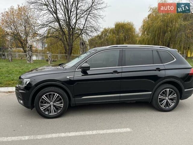 Чорний Фольксваген Тігуан, об'ємом двигуна 2 л та пробігом 124 тис. км за 19500 $, фото 69 на Automoto.ua