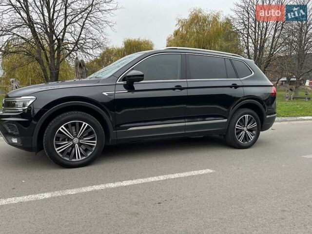 Чорний Фольксваген Тігуан, об'ємом двигуна 2 л та пробігом 124 тис. км за 19500 $, фото 102 на Automoto.ua