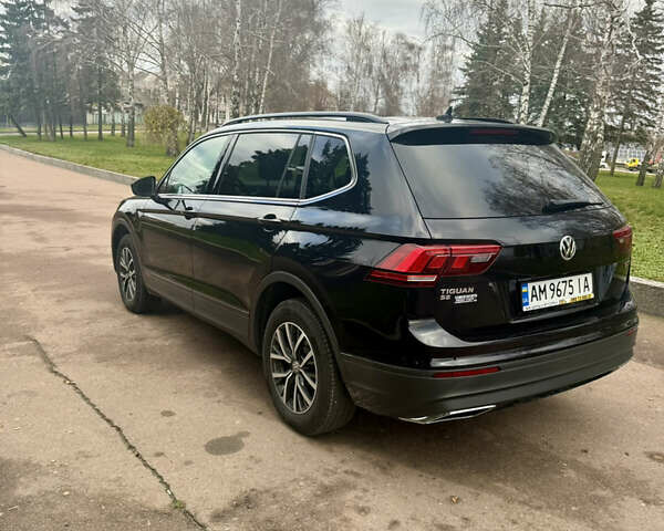 Чорний Фольксваген Тігуан, об'ємом двигуна 2 л та пробігом 159 тис. км за 19000 $, фото 5 на Automoto.ua