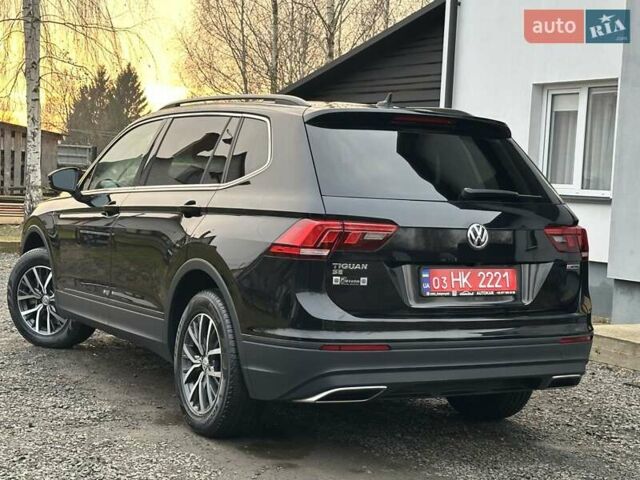 Чорний Фольксваген Тігуан, об'ємом двигуна 2 л та пробігом 200 тис. км за 15900 $, фото 5 на Automoto.ua