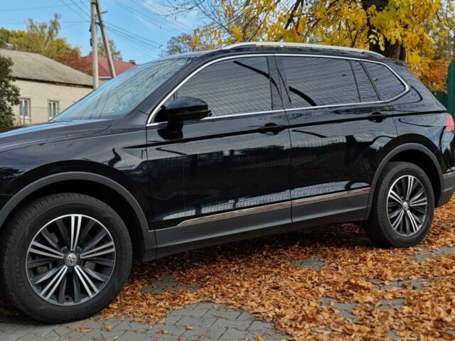 Черный Фольксваген Тигуан, объемом двигателя 2 л и пробегом 314 тыс. км за 14700 $, фото 1 на Automoto.ua