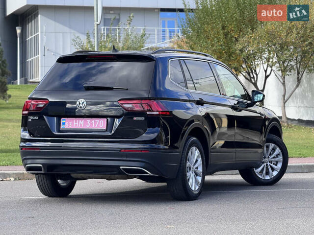 Чорний Фольксваген Тігуан, об'ємом двигуна 2 л та пробігом 109 тис. км за 18950 $, фото 1 на Automoto.ua