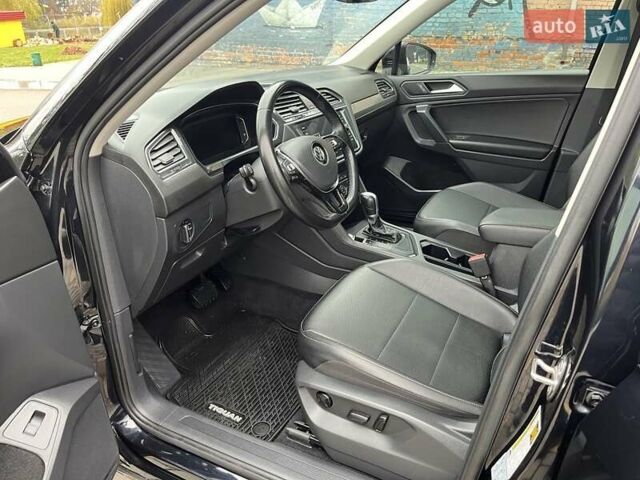 Чорний Фольксваген Тігуан, об'ємом двигуна 2 л та пробігом 124 тис. км за 19500 $, фото 32 на Automoto.ua