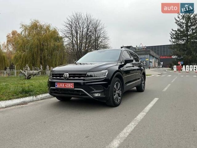 Чорний Фольксваген Тігуан, об'ємом двигуна 2 л та пробігом 124 тис. км за 19500 $, фото 95 на Automoto.ua